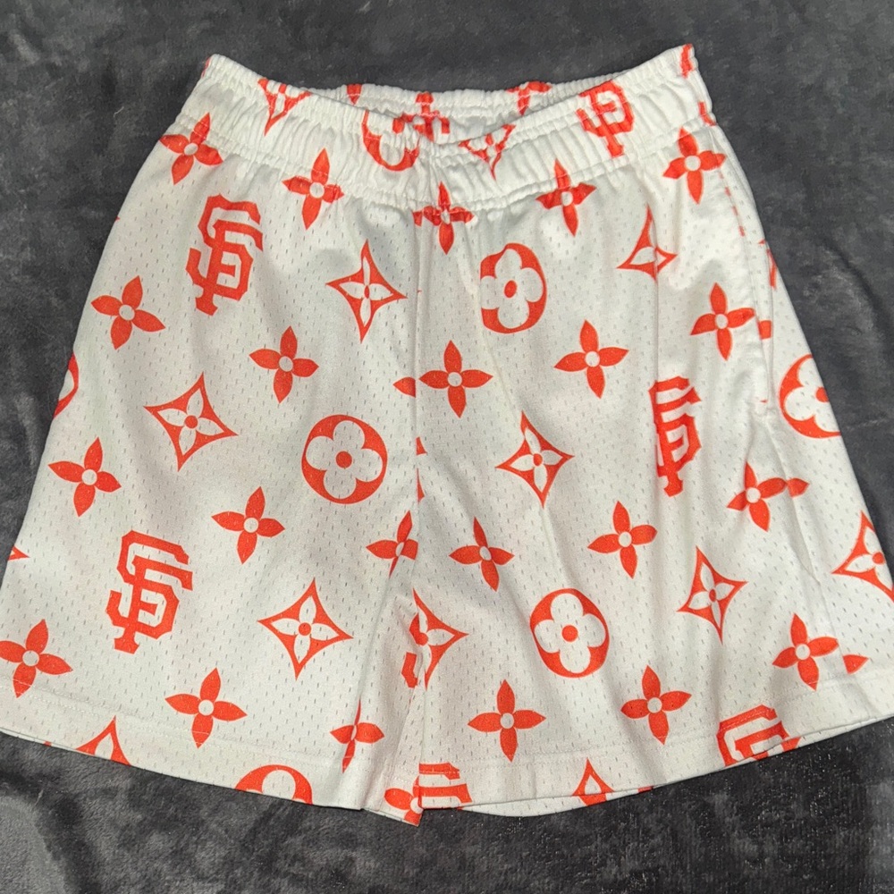 Stylish White and Orange Patterned Athletic Shorts